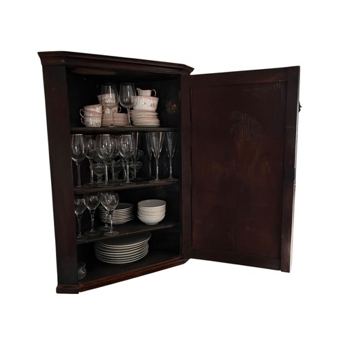 637 - A mahogany linen press with cupboard above and brass hanging rail and three drawers to base, 130 cm ... 