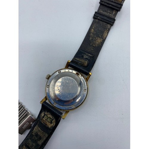 330 - A gents watch, stamped to face MOVADO, Hamilton & Co, Calcutta, serial number stamped to clasp, and ... 