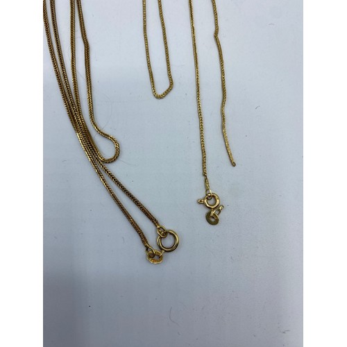 300 - An 18ct gold snake link necklace, 52cm, and an 18ct gold Brazilian link necklace (a small break) 8 g... 