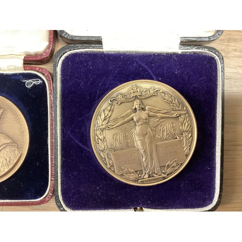 346 - Three cased early C20th medals to include 1927 Car racing medals.