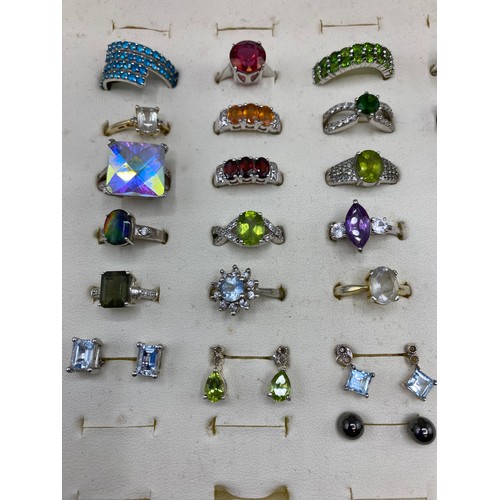 339 - Box of rings, silver and mixed semi precious stones and silver earrings, see images.  All marked 925