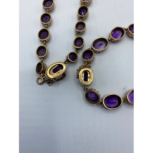 308 - A 9ct gold and oval cut graduated amethyst. Late 19th early 20th Century amethyst suite of jewellery... 