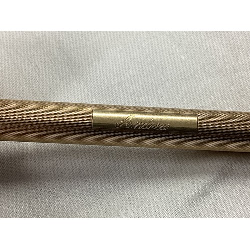 272 - A yellow metal propelling pencil marked 585 14k gold, with white metal tip and steel interior, 20g. ... 