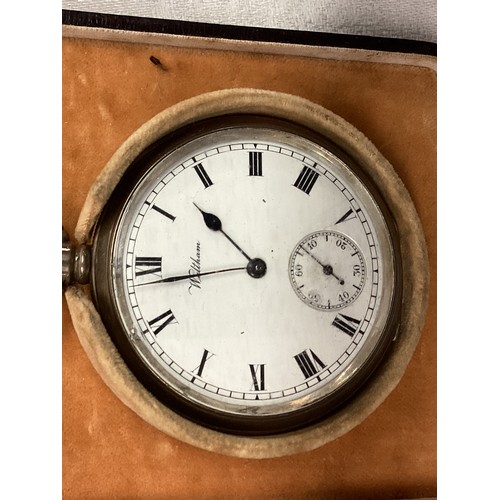 350 - A sterling silver pocket watch , cased, Waltham, and another small circular clock, stamped DRUMMOND ... 