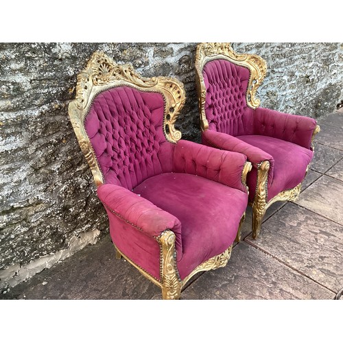 660 - A pair of upholstered button back gilt painted armchairs and a set of six metal garden chairs