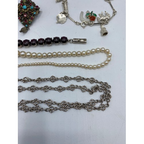 335 - A quantity of silver and white metal jewellery and items.