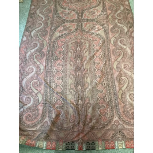 214 - Two Paisley throws/tablecloths both with damage and repairs. Two patterned throws/tablecloths. Embro... 