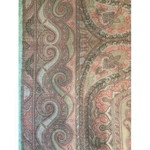 214 - Two Paisley throws/tablecloths both with damage and repairs. Two patterned throws/tablecloths. Embro... 