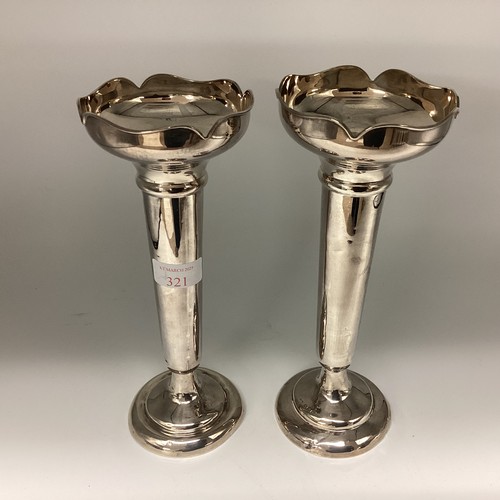 321 - A pair of weighted sterling silver trumpet vases, approx 32cm High. Gross weight 555g.