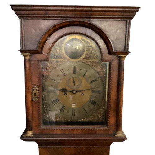 400 - A Long case clock  mahogany and walnut veneered 8 day , by Christopher Tucker London, The arch brass... 