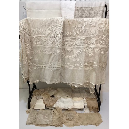 213 - A quantity of good C19th and later Lace table cloths, other lace and other linen, with good Provenan... 