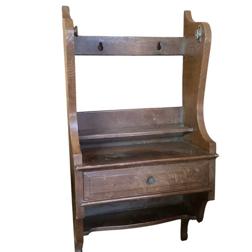 657 - A Lloyd loom laundry basket with hinged lid, two chairs, a child’s desk, oak stool and a cabinet.