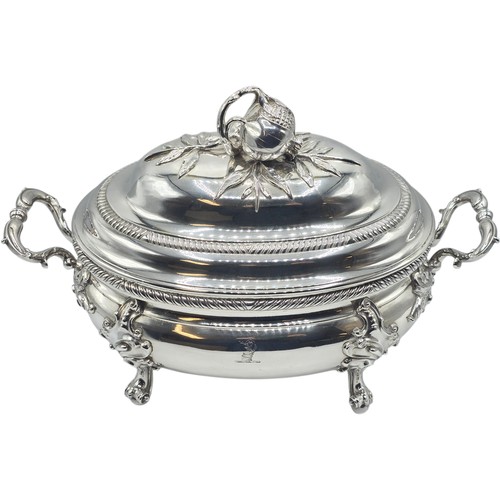 2 - An Irish Silver lidded oval tureen with cast poppy finial,  loop handles on four scroll feet, 38 cm ... 