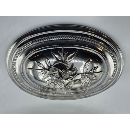 2 - An Irish Silver lidded oval tureen with cast poppy finial,  loop handles on four scroll feet, 38 cm ... 
