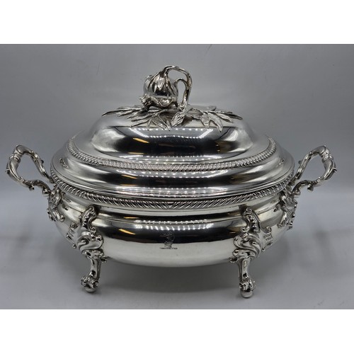 2 - An Irish Silver lidded oval tureen with cast poppy finial,  loop handles on four scroll feet, 38 cm ... 