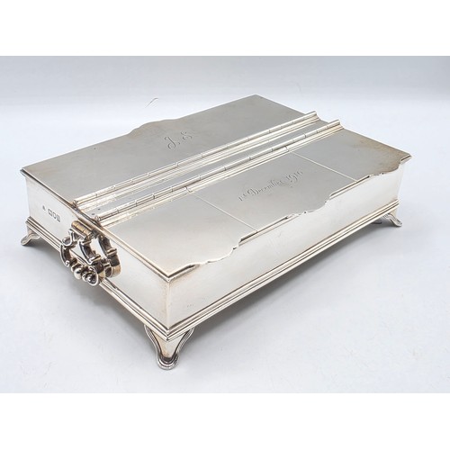 10 - A sterling silver inkwell desk tidy with two removable silver topped glass inkwells with articulated... 