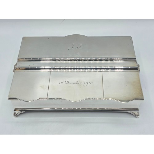 10 - A sterling silver inkwell desk tidy with two removable silver topped glass inkwells with articulated... 