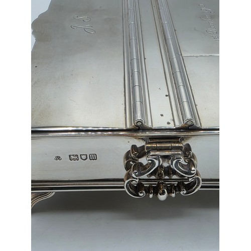 10 - A sterling silver inkwell desk tidy with two removable silver topped glass inkwells with articulated... 