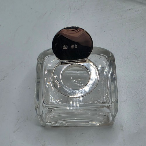 10 - A sterling silver inkwell desk tidy with two removable silver topped glass inkwells with articulated... 