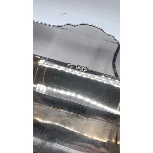 10 - A sterling silver inkwell desk tidy with two removable silver topped glass inkwells with articulated... 