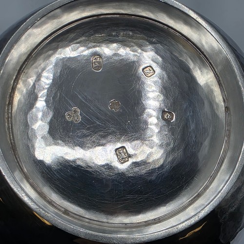 14 - A sterling silver hand planished tea pot, S J Phillips London 2000, gross weight 897 g