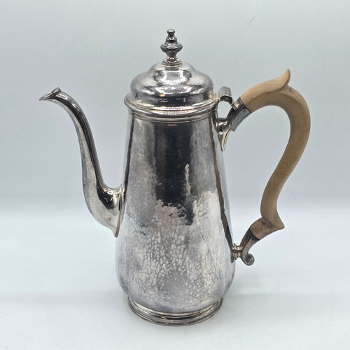 15 - A sterling silver hand planished coffee pot by S J Phillips London 2000, gross weight 911 g