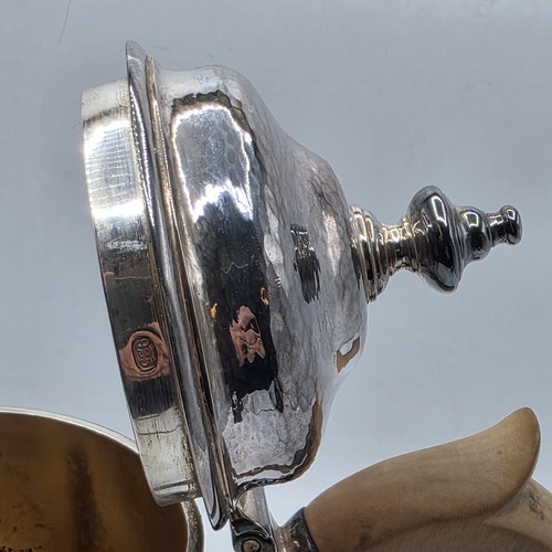 15 - A sterling silver hand planished coffee pot by S J Phillips London 2000, gross weight 911 g