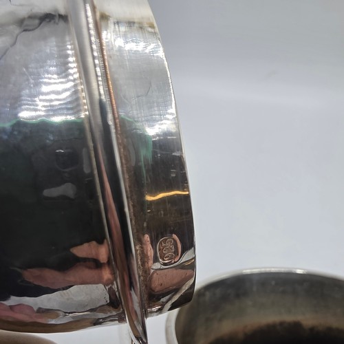 14 - A sterling silver hand planished tea pot, S J Phillips London 2000, gross weight 897 g