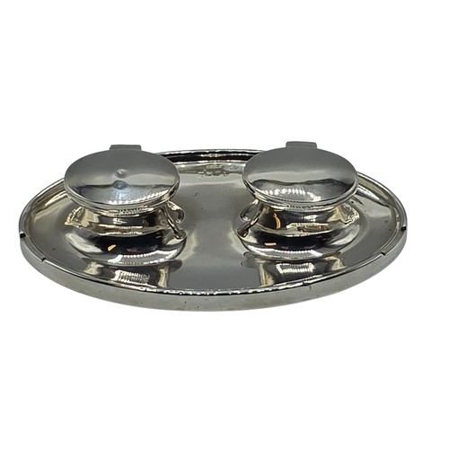 19 - A sterling silver capstan double ink well with weighted base, marks worn. Gross weight 690g.