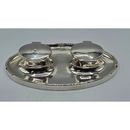 19 - A sterling silver capstan double ink well with weighted base, marks worn. Gross weight 690g.