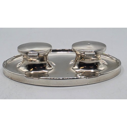 19 - A sterling silver capstan double ink well with weighted base, marks worn. Gross weight 690g.