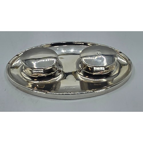 19 - A sterling silver capstan double ink well with weighted base, marks worn. Gross weight 690g.