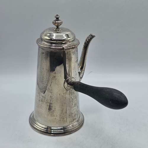 16 - A matched pair of sterling silver chocolate pots with ebonised handles, Martin Hall & Co.  Sheffield... 