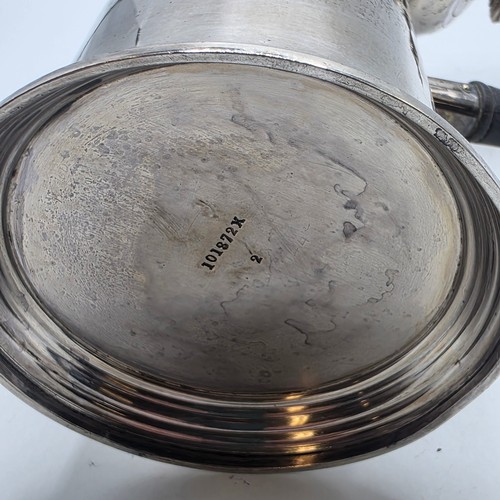 16 - A matched pair of sterling silver chocolate pots with ebonised handles, Martin Hall & Co.  Sheffield... 