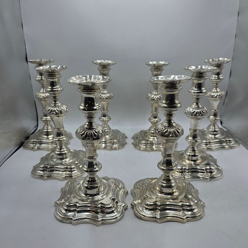 9 - A set of eight solid sterling silver table candlesticks, stepped square basis, S J Phillips London L... 