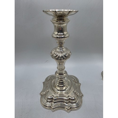 9 - A set of eight solid sterling silver table candlesticks, stepped square basis, S J Phillips London L... 