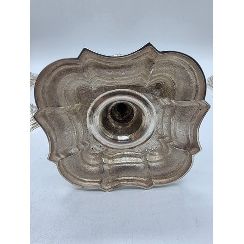 9 - A set of eight solid sterling silver table candlesticks, stepped square basis, S J Phillips London L... 