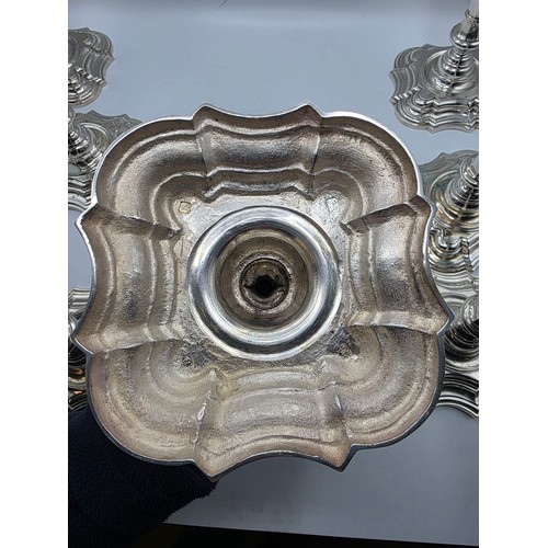 9 - A set of eight solid sterling silver table candlesticks, stepped square basis, S J Phillips London L... 