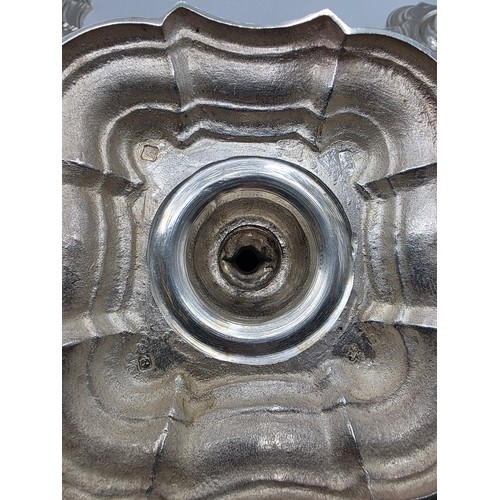 9 - A set of eight solid sterling silver table candlesticks, stepped square basis, S J Phillips London L... 