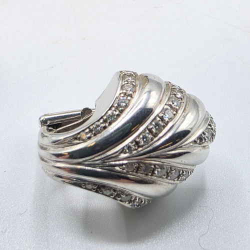 26 - An unmarked yellow and white metal diamond set metamorphic earing set in fitted felt lined case with... 