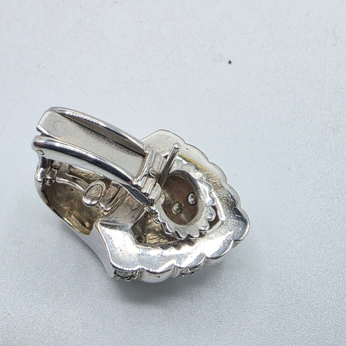 26 - An unmarked yellow and white metal diamond set metamorphic earing set in fitted felt lined case with... 