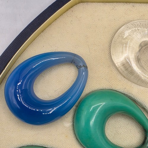 26 - An unmarked yellow and white metal diamond set metamorphic earing set in fitted felt lined case with... 