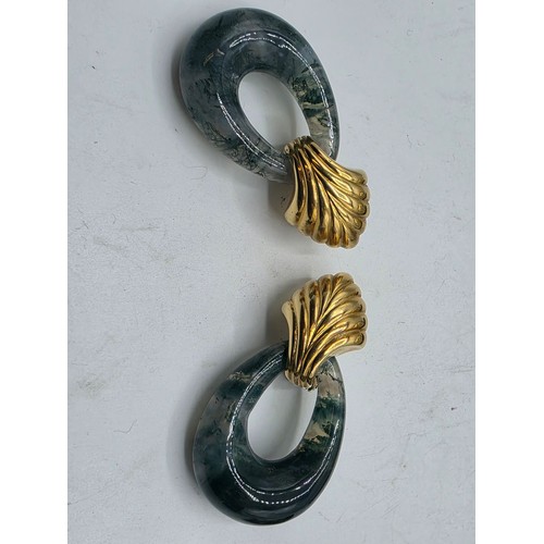 26 - An unmarked yellow and white metal diamond set metamorphic earing set in fitted felt lined case with... 