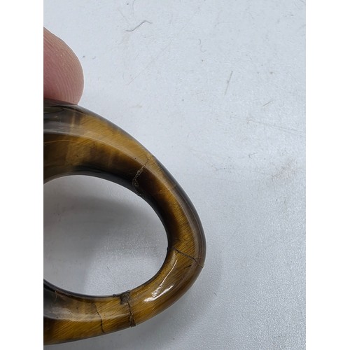 26 - An unmarked yellow and white metal diamond set metamorphic earing set in fitted felt lined case with... 