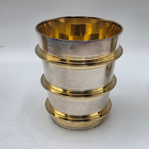 27 - A set of twelve  Sterling silver gilt water beakers with gilt ribbed design and interiors each 9.5 c... 