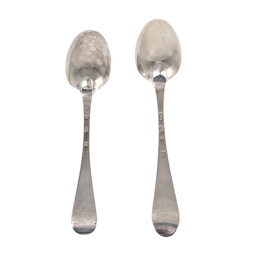 31 - Two 18th century sterling silver spoons with worn marks 128 g
