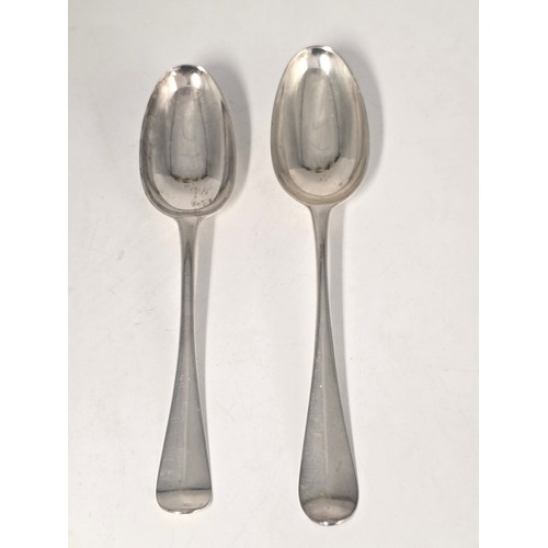 31 - Two 18th century sterling silver spoons with worn marks 128 g