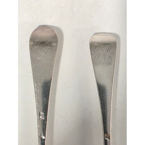 31 - Two 18th century sterling silver spoons with worn marks 128 g