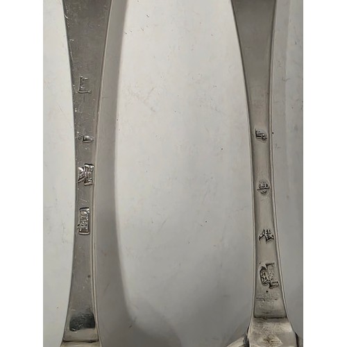 31 - Two 18th century sterling silver spoons with worn marks 128 g