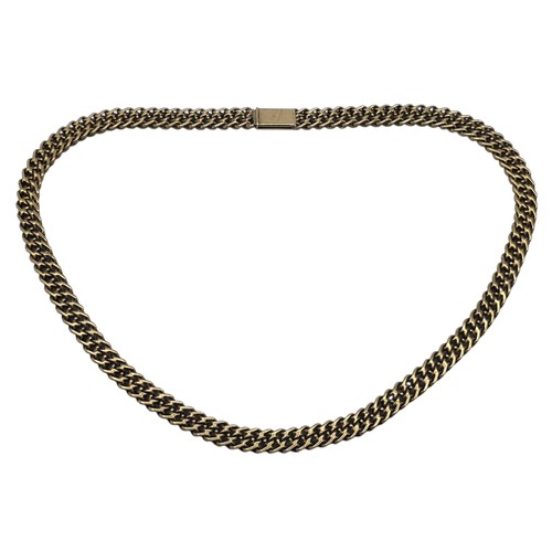 24 - An unmarked yellow metal flat fancy link necklace 44 cm 35.5 g